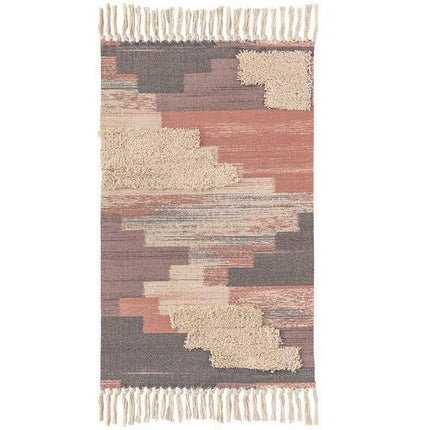 Piccolo tappeto rosa con frange decorative