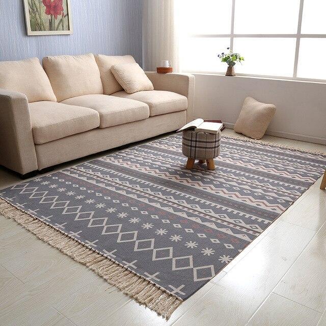 Tappeto beige e grigio geometrico