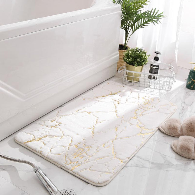 Tappetino bagno bianco effetto marmo dorato