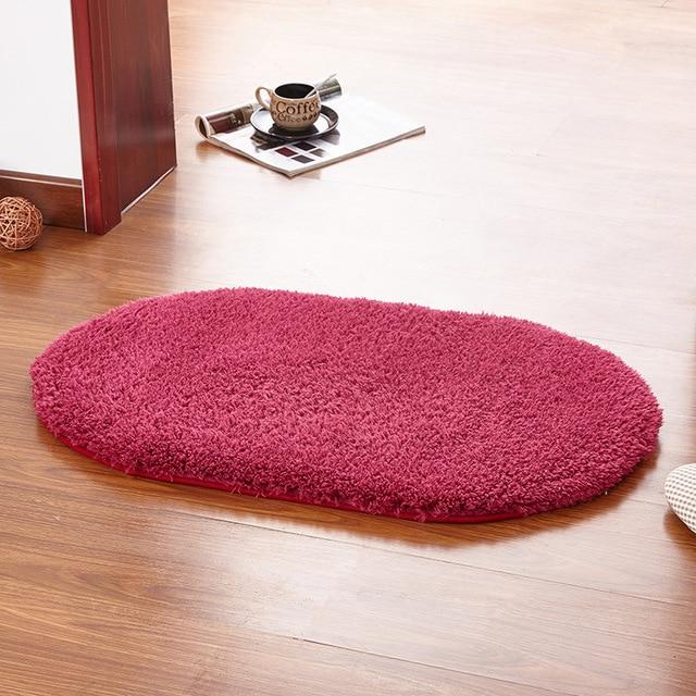 Tappeto da bagno ovale colore fucsia