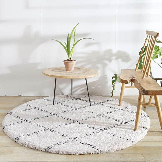 Tappeto rotondo soffice con design berbero