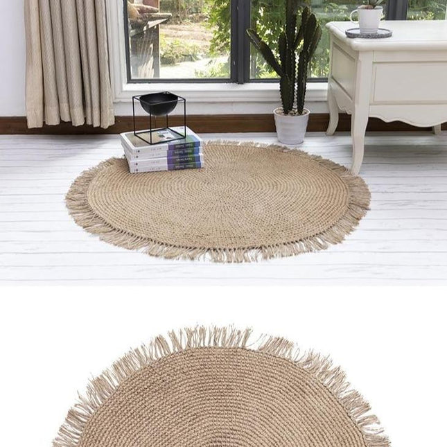 Tappeto rotondo in iuta beige con frange