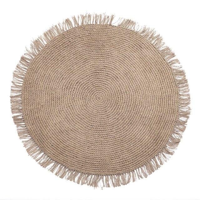 Tappeto rotondo in iuta beige con frange