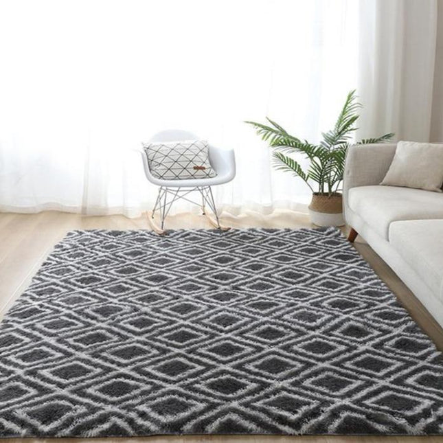 Tappeto nero moderno con motivo geometrico
